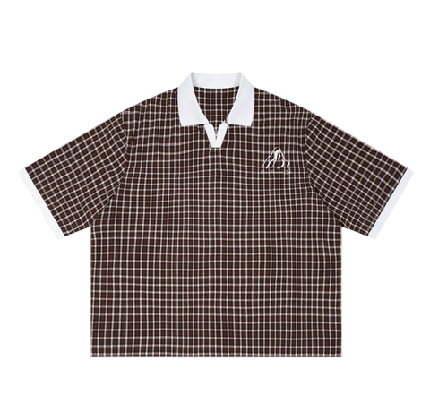 A short-sleeve polo shirt with a brown and white grid pattern, featuring a solid white collar and white sleeve cuffs, with a small white logo on the left chest.